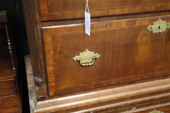 A George II walnut chest on chest, W.3ft 5in. D.1ft 10in. H.6ft 5in.